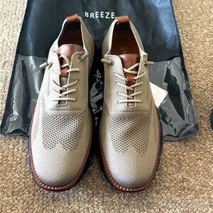 Size 12 American (46 European) Urban Ultra brown shoe with black sole.